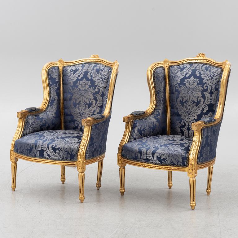 A pair of Louis XVI style armchairs, late 20th Century.
