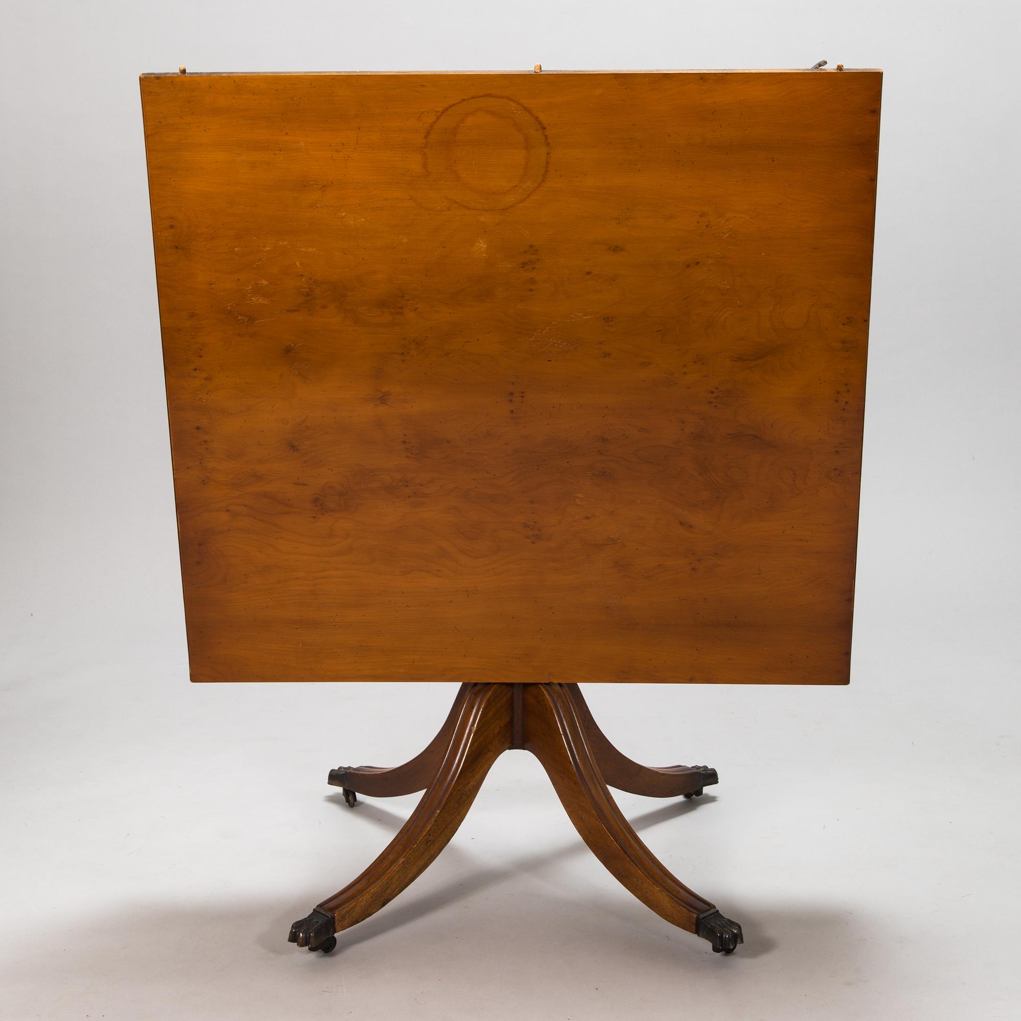 A 20th century English style dining table.