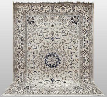 A Nain carpet, part silk, so-called 9 LAA, approx. 355 x 248 cm.
