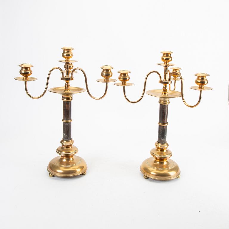 A pair of brass and wood candelabras early 1900s.