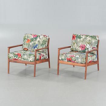 a pair of "USA 75" longe chairs, designed in 1963.