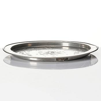 Firma Svenskt Tenn, a set of two pewter trays, Stockholm, 1930 and 1927.