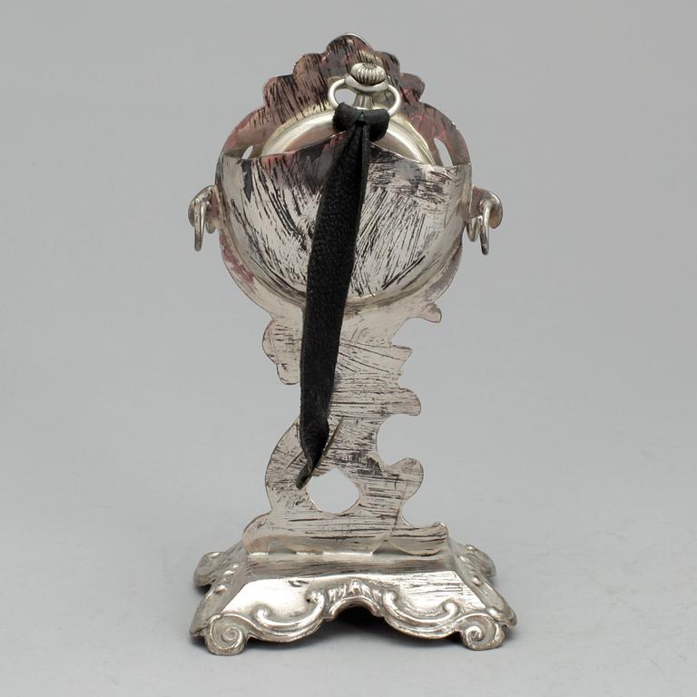 FICKUR MED STÄLL, silver, nyrokoko, troligen Pehr Fredrik Palmgren, Stockholm, 1858, otydliga stämplar.