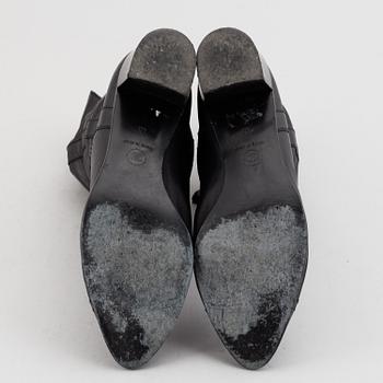 CHANEL, a pair of leather boots, size 40.