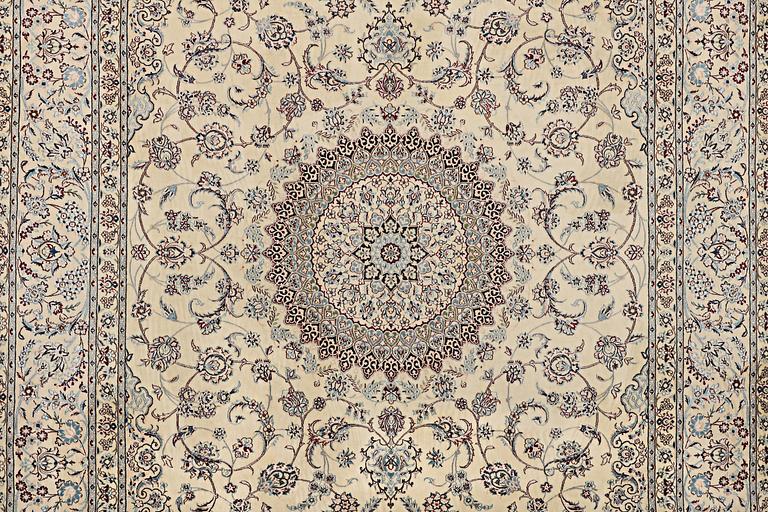 A Nain carpet, part silk, 6 laa, c. 295 x 205 cm.
