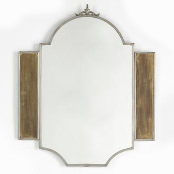 A 1930's pewter mirror.