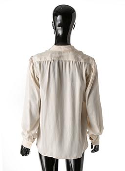 BLUS, Yves Saint Laurent.