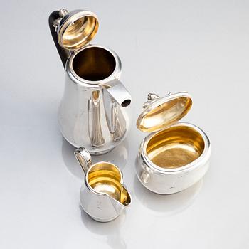 Kaffeservis, 3 delar, silver, handarbete/driven, design Oscar Brandtberg, W.A. Bolin, Stockholm 1946.