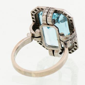 A RING, facetted aquamarine, 8/8 cut diamonds, 18K white gold. A. Tillander, Helsinki Finland 1972.