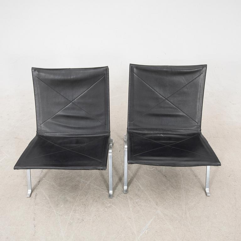 A pair of "PK22" leather armchairs by Poul Kjaerholm for E Kold Christensen, Denmark.