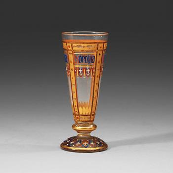 964. A small Russian vodka glass painted with enamel colours and gold, late 19th Century.
