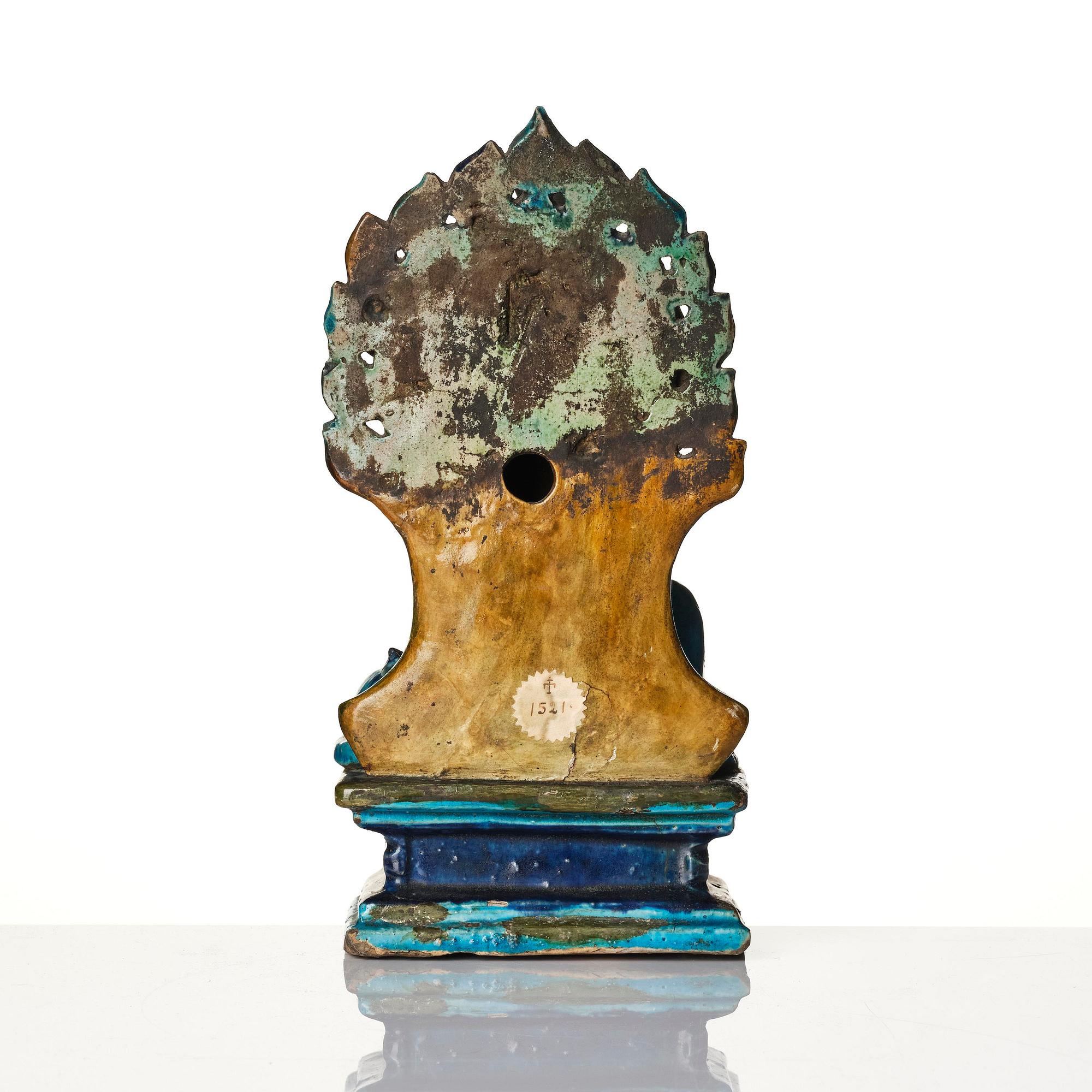 A  turquoise glazed figure of Guanyin, Ming dynasty (1368-1644).
