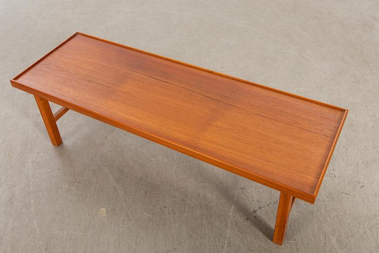 A 1960/70s teak bench.