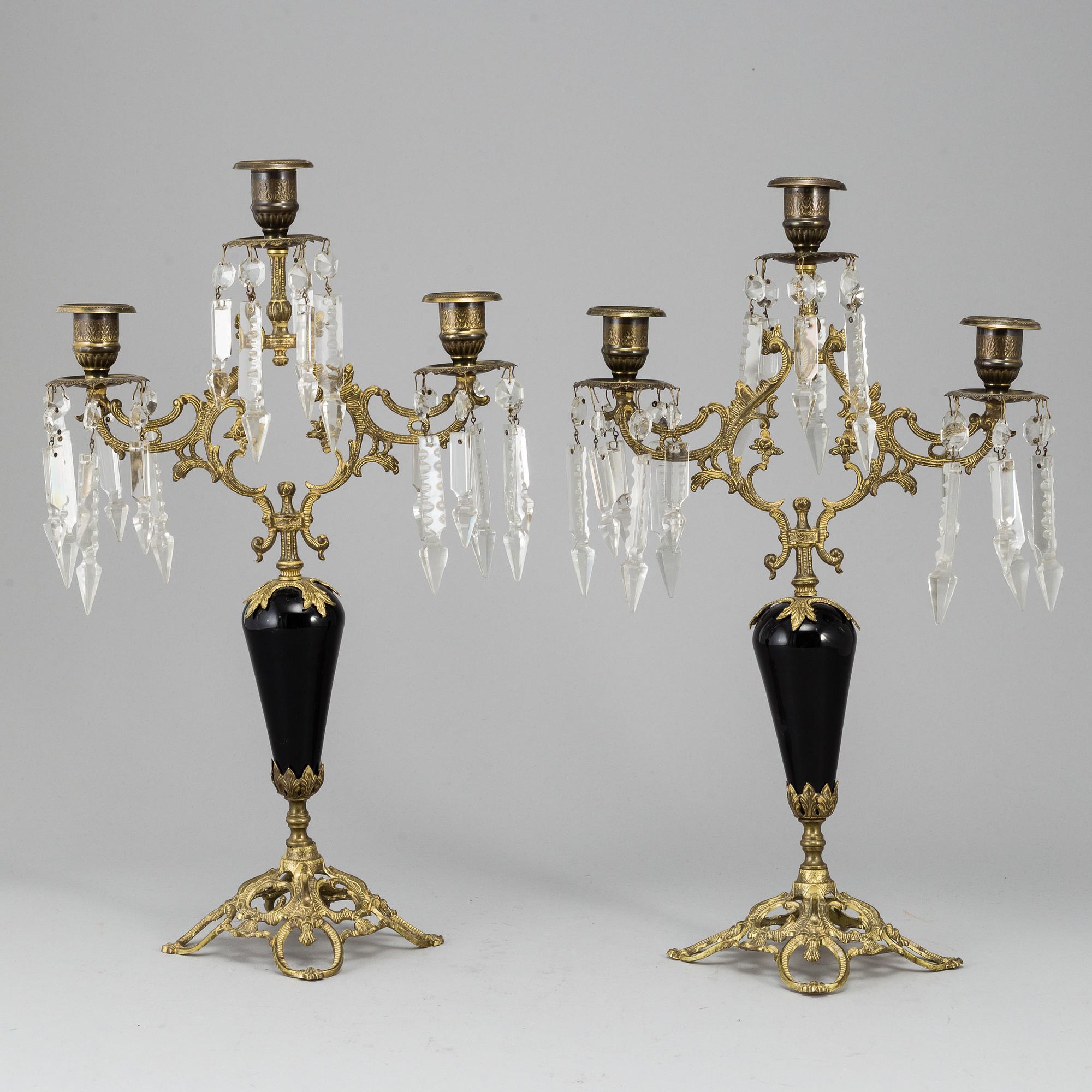 A pair of Victorian brass candelabra from around year 1900.