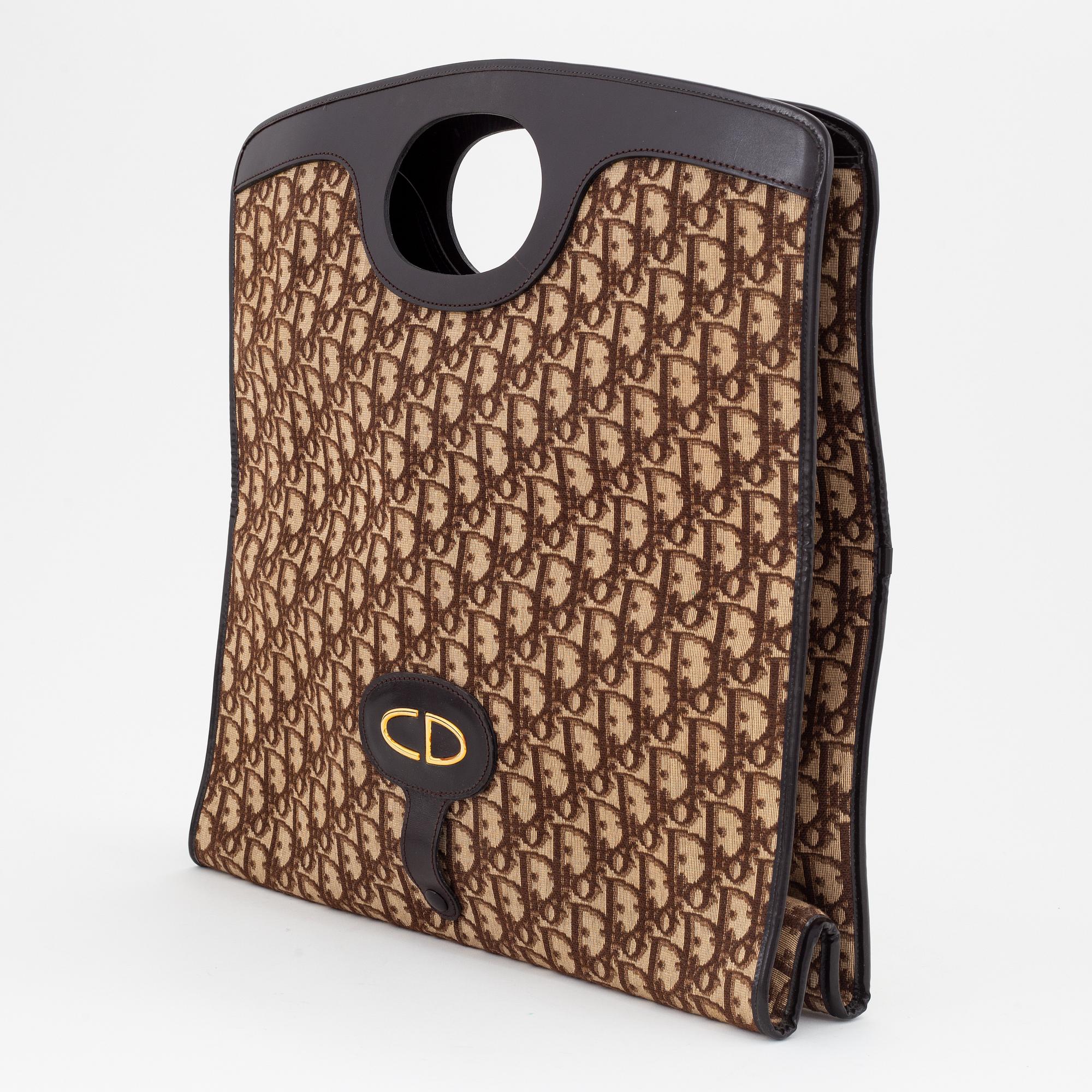 Christian Dior, a canvas tote bag.