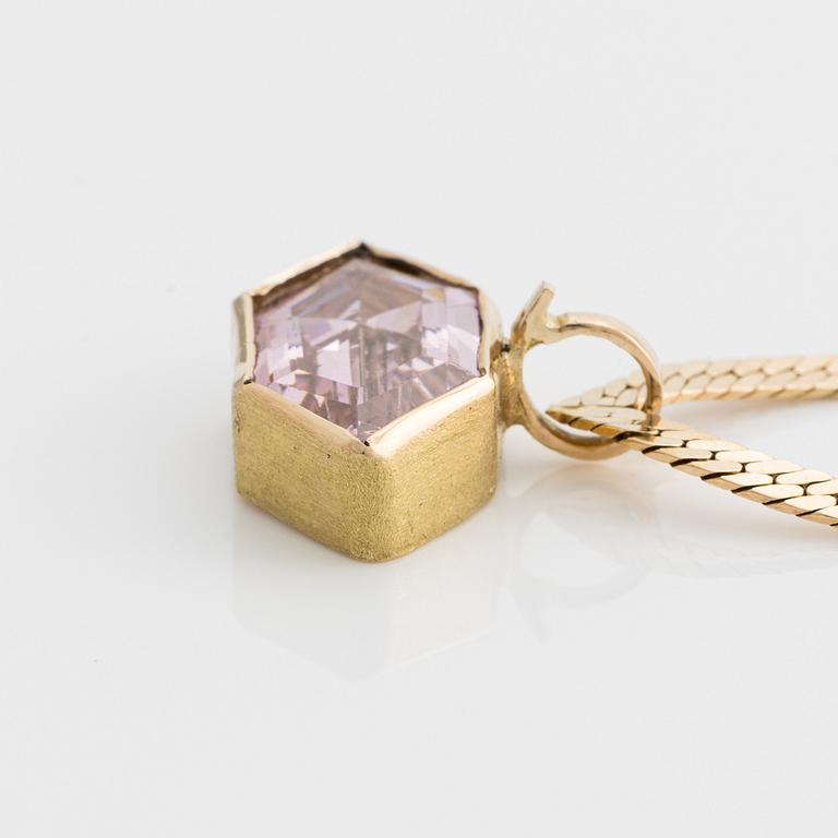 Necklace, gold with pendant featuring a rose-tinted stone.