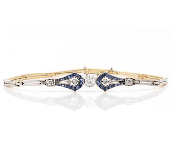 An Art Deco bracelet with old-cut diamonds and carré-cut sapphires.