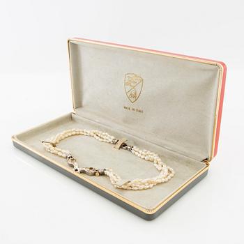 Tonino Lamborghini, Necklace of cultured pearls with a pendant of 18K gold, silver, and faceted citrines.
