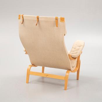 Bruno Mathsson, a 'Pernilla' armchair, Dux, late 20th Century.