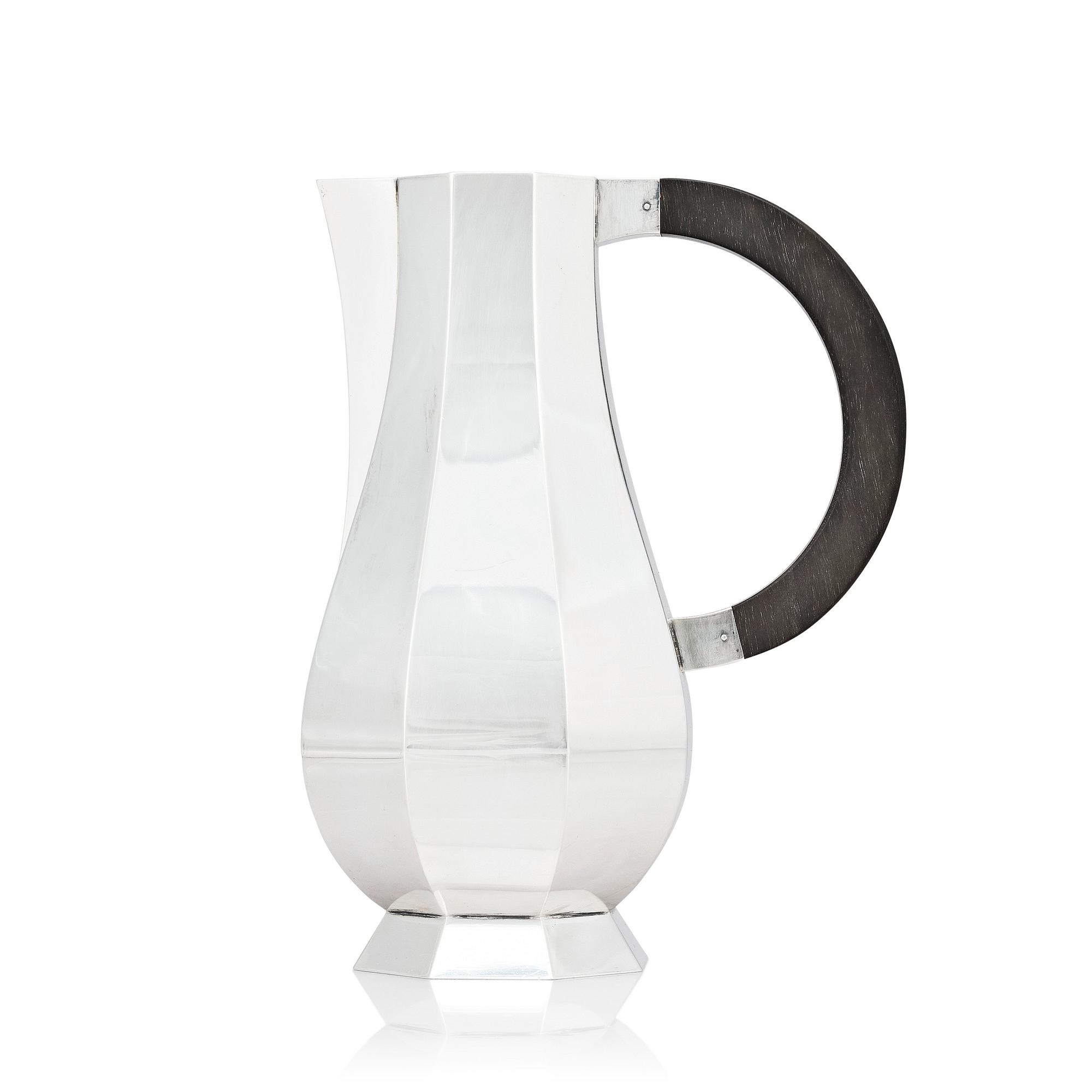 Wiwen Nilsson, a sterling silver pitcher, a 'hot water jug,' Lund, Sweden 1941.
