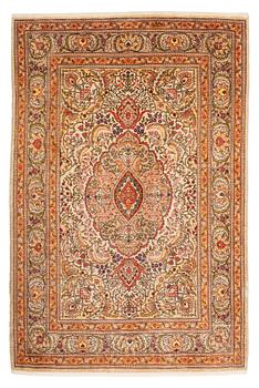 346. A silk Hereke rug, ca 101 x 69 cm.