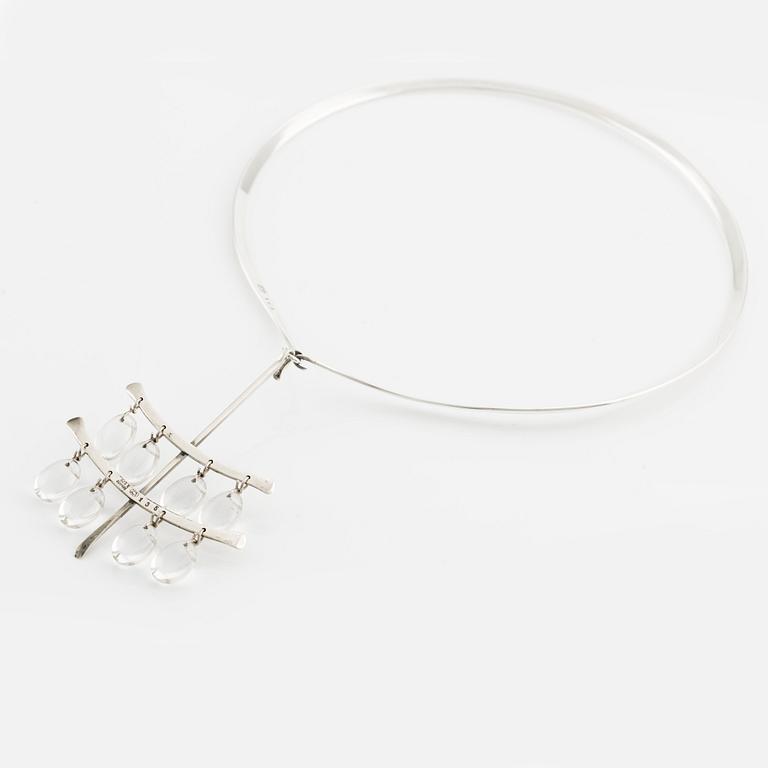 Vivianna Torun Bülow-Hübe, a necklace with a pendant, No. 169 and No. 135, sterling silver with rock crystal, for Georg Jensen, Copenhagen.