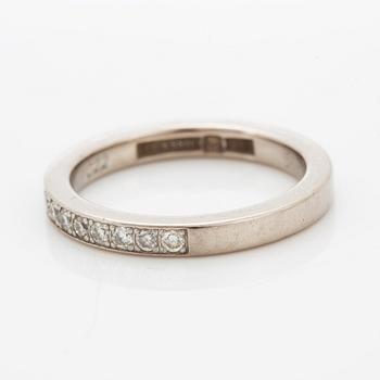 Brilliant-cut diamond half eternity ring.