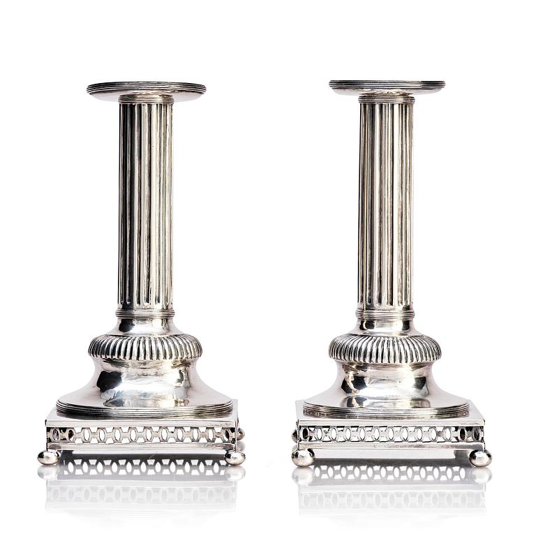 A pair of Swedish 18th century Gustavian silver candlesticks, marks of Arvid Floberg, Stockholm 1799.