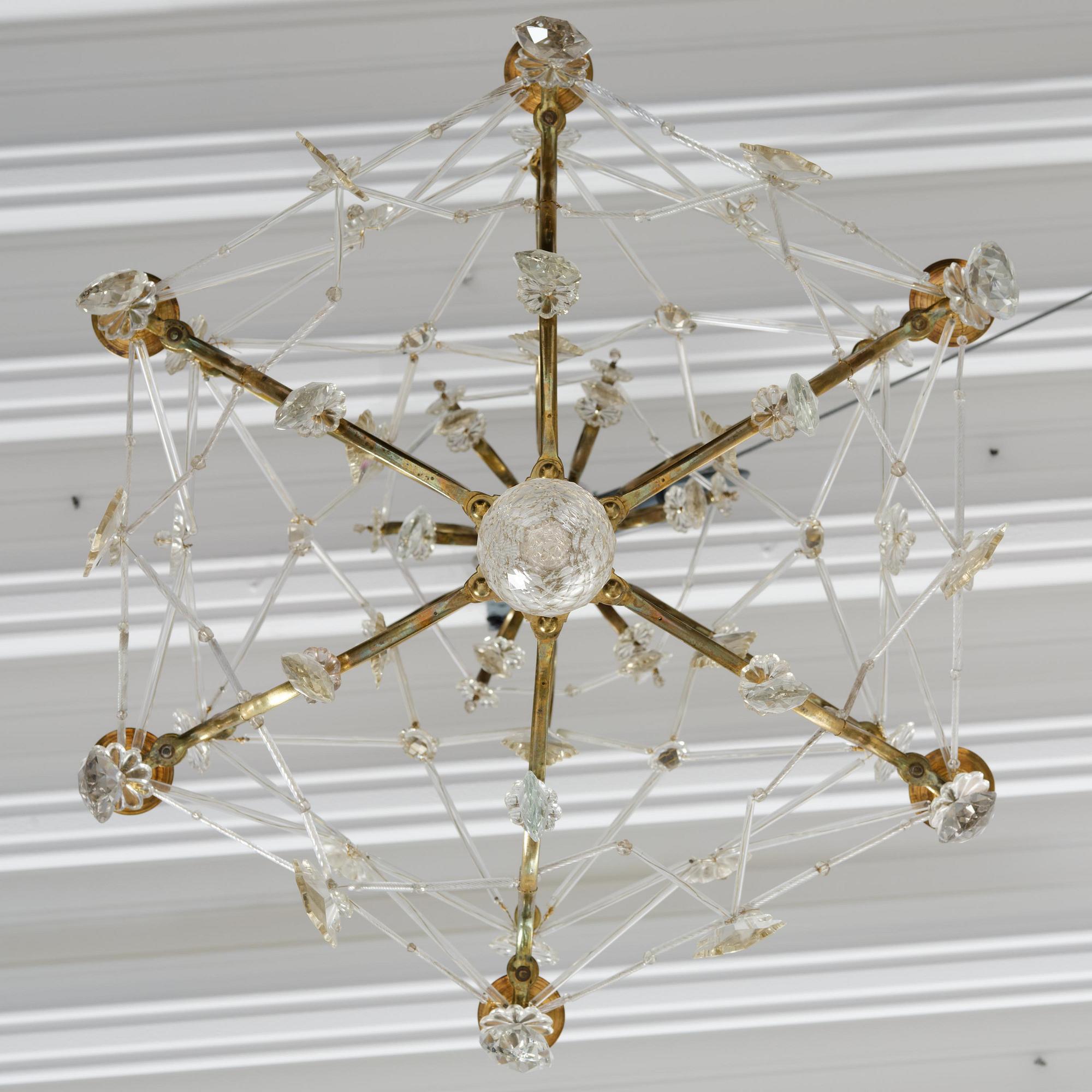 A seven-light gilt brass and cut glass rococo chandelier, mid 18th century.