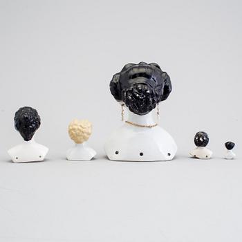 A lot of 12 dolls and doll heads in porcelain Germany early 20th century.