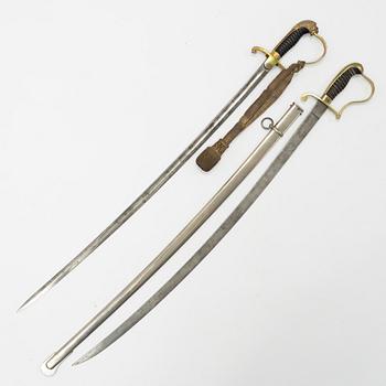 Two German sabres, 19th Century, one with scabbard.