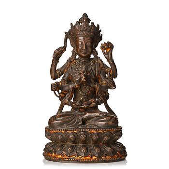 854. A cold gilt copper alloy figure of eight armed Boddhisattva Avalokiteshvara, late Ming dynasty.