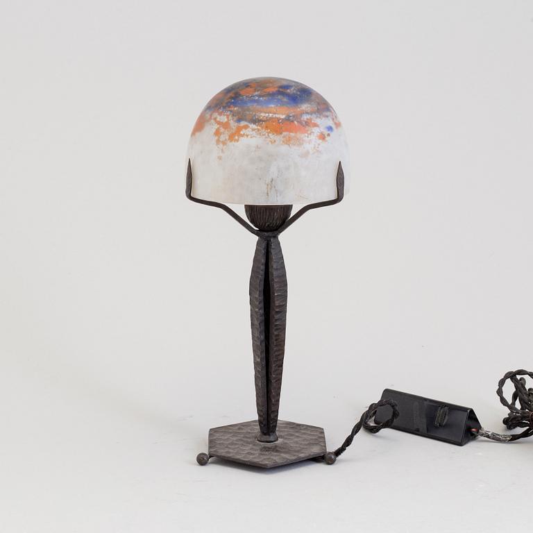 A French early 20th century Art Nouveau Daum table light from Nancy signed Daum Nancy France.