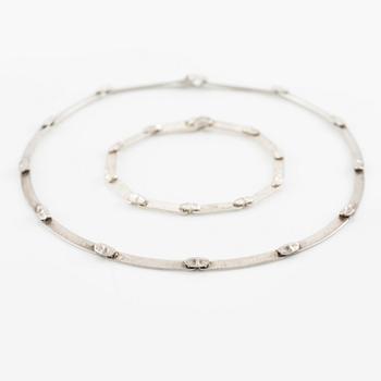 Lapponia a necklace, a pair of earrings and a brooch, sterling silver.