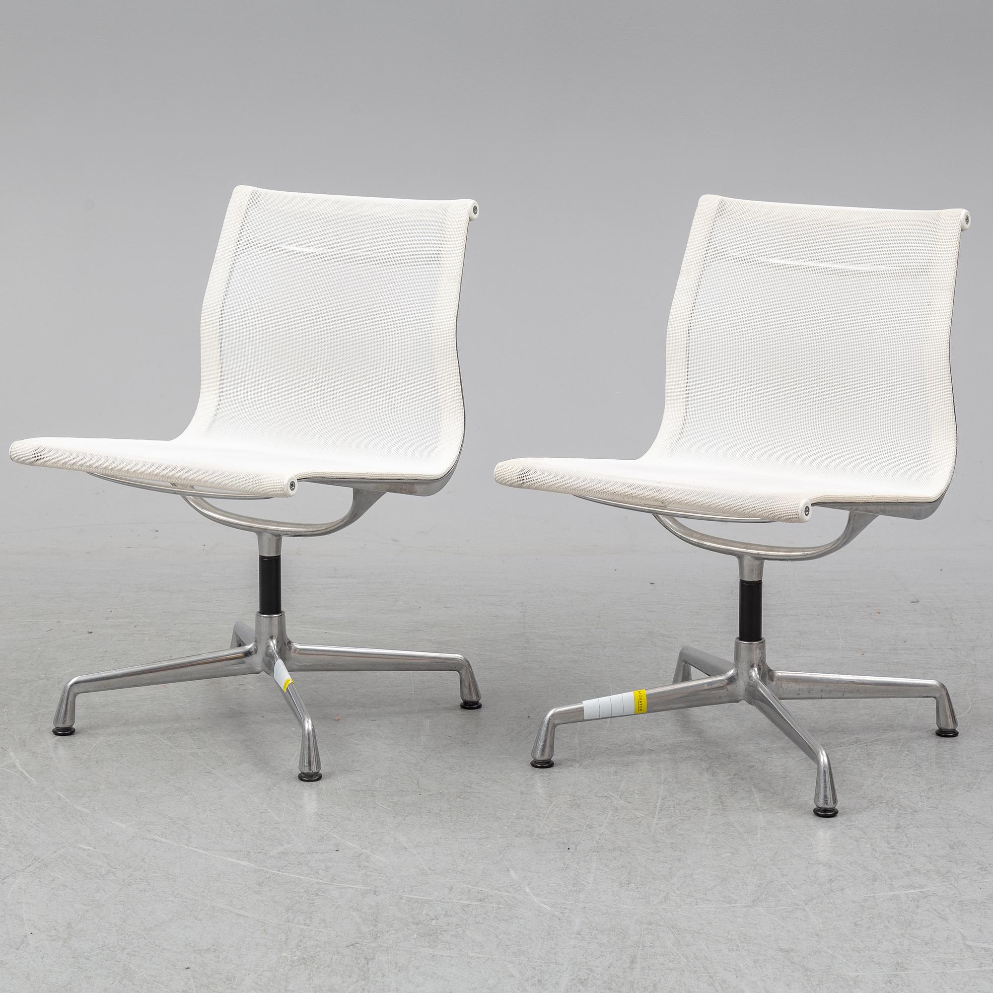 CHARLES & RAY EAMES, a pair of 'EA 101' chairs, Vitra.