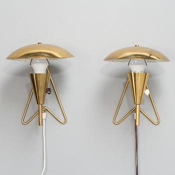 A pair of mid-20th-century wall lights / table lamps, model EV 57 for Itsu, Finland.