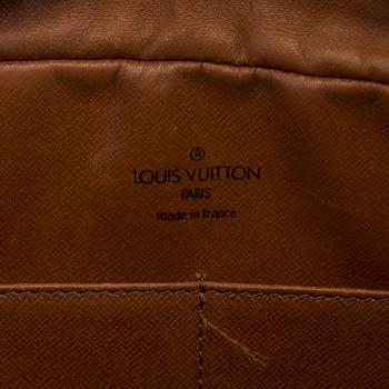 A bag by Louis Vuitton.