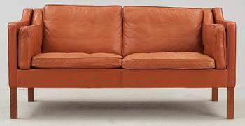 A Børge Mogensen brown leather two-seated sofa, Fredricia Stolefabrik, Denmark.