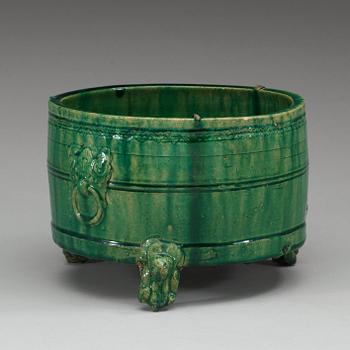 A green glazed tripod censer, presumably Han dynasty.