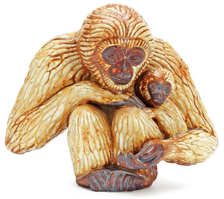 A Gunnar Nylund stoneware figure of a gibbon ape with child, Rörstrand.