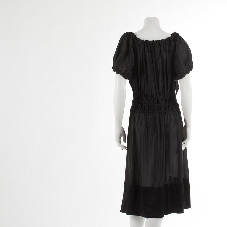 DKNY, a black silk dress. Size M.