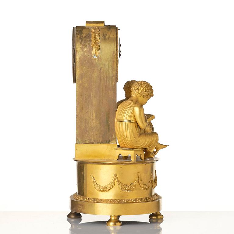A French Empire ormolu mantel clock, early 19th century.