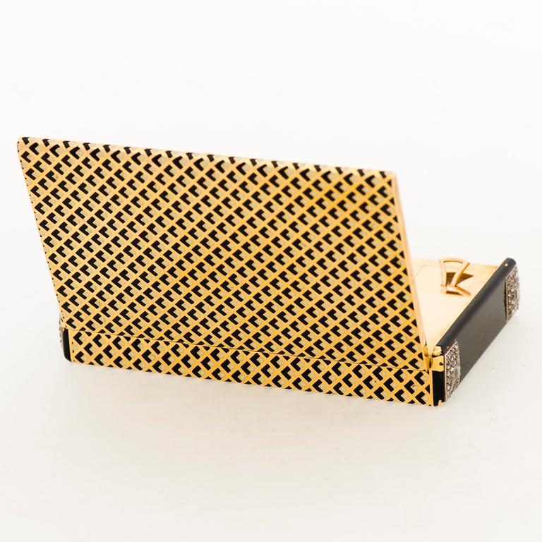 Cartier Art Deco Vanity Case 18K guld med svart emalj och baguette- och rosenslipade diamanter.