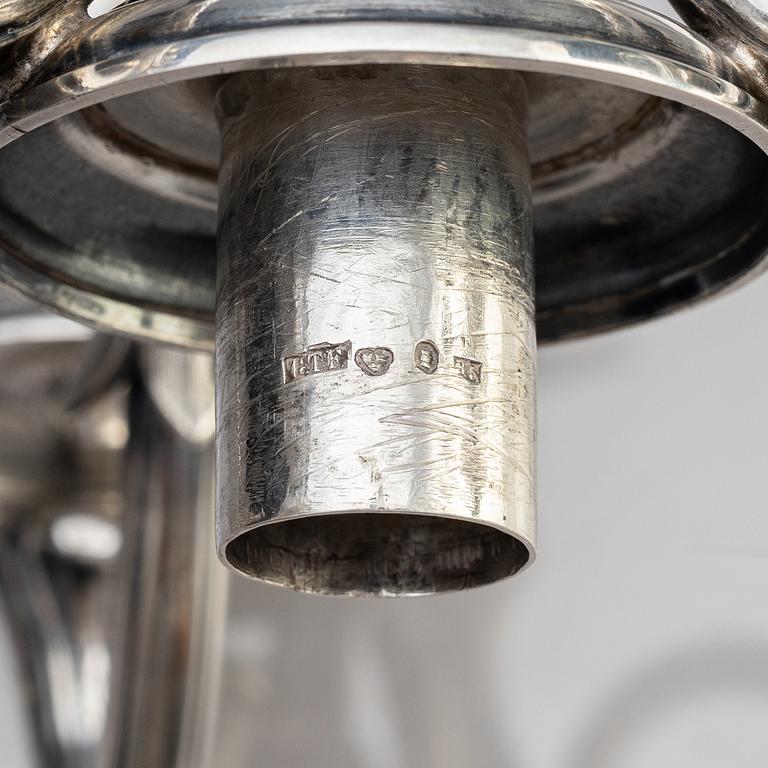 A pair of Swedish 19th century silver candelabra, marks of Gustaf Theodor Folcker, Stockholm 1871.