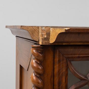 A mahogany veneered Gothic Revival cabinet, second half of the 19th Century.