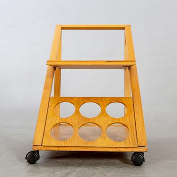 An Italian oak trolley later part of the 20th century.