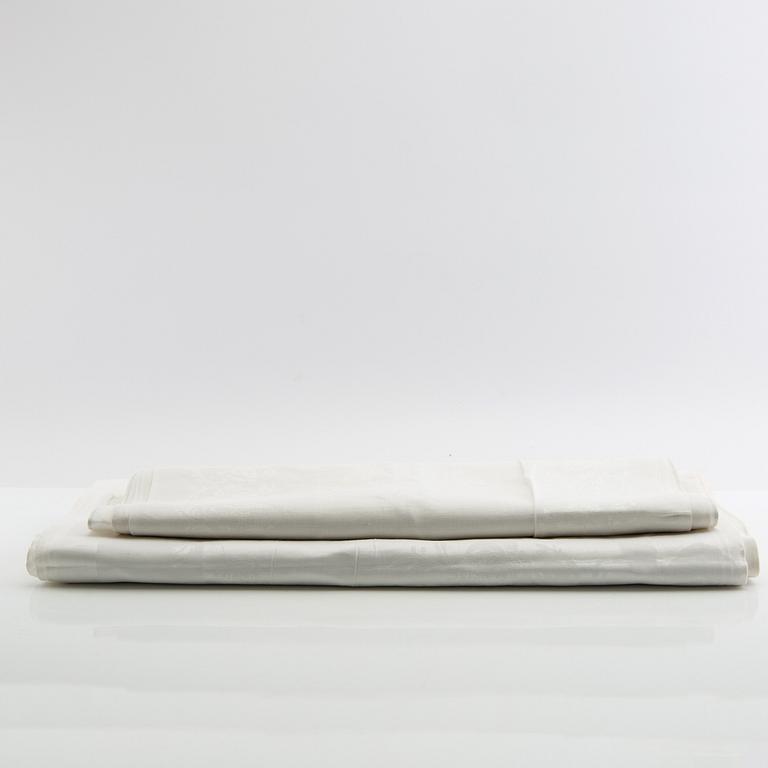 Tablecloth and napkins, 11 pcs, damask, first half/mid 20th century.