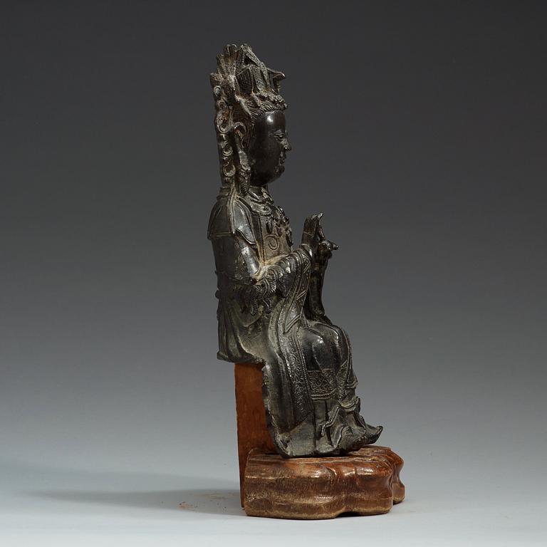 A seated bronze figure of Xi Wangmu, Ming dynasty, 17th Century.