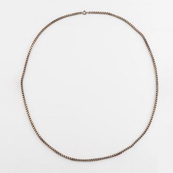 Silver necklace.