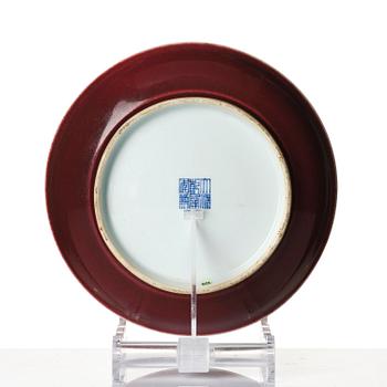 A copper-red glazed dish, Qing dynasty, Qianlong mark and of the period (1736-95).
